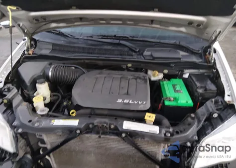 2012 Dodge Grand Caravan Crew z USA, uszkodzony, nr VIN 2C4RDGDG2CR299058